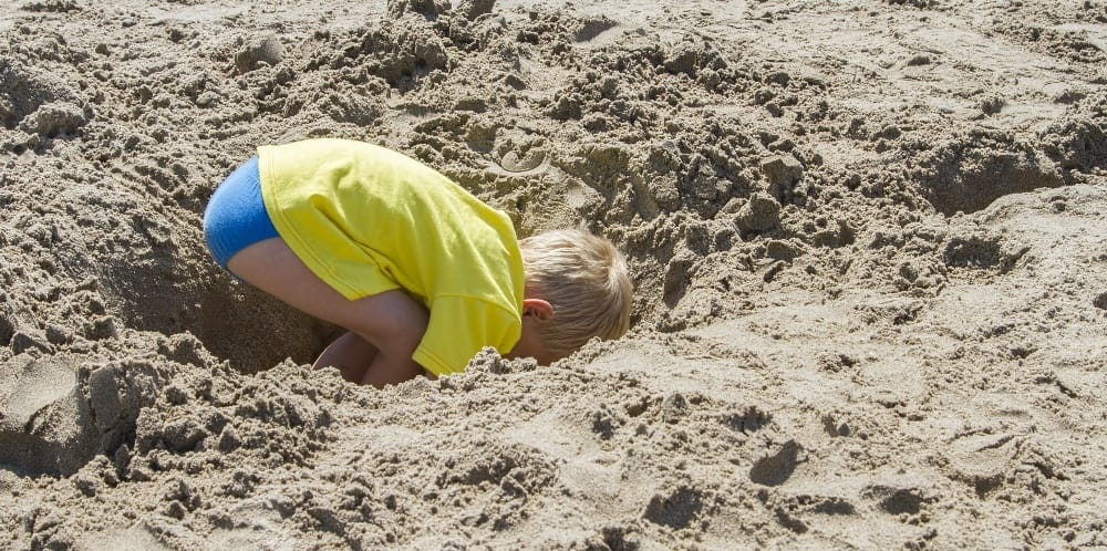 Fun Beach Games and Activities for Kids: Hole Digging